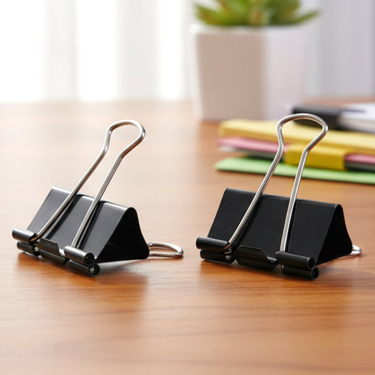 Durable metal 51 mm large binder clips holding thick papers