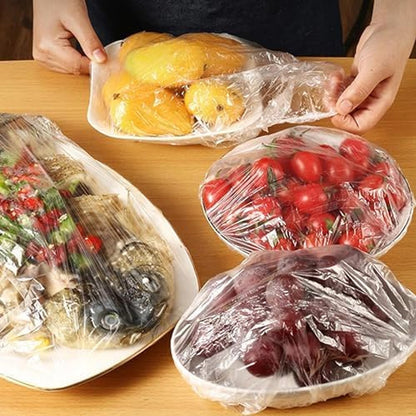 Multiple stretchable food covers securing different sized containers, showcasing versatile fresh food storage.